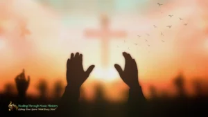 Silhouetted hands raised in worship against a sunset background with a glowing cross.