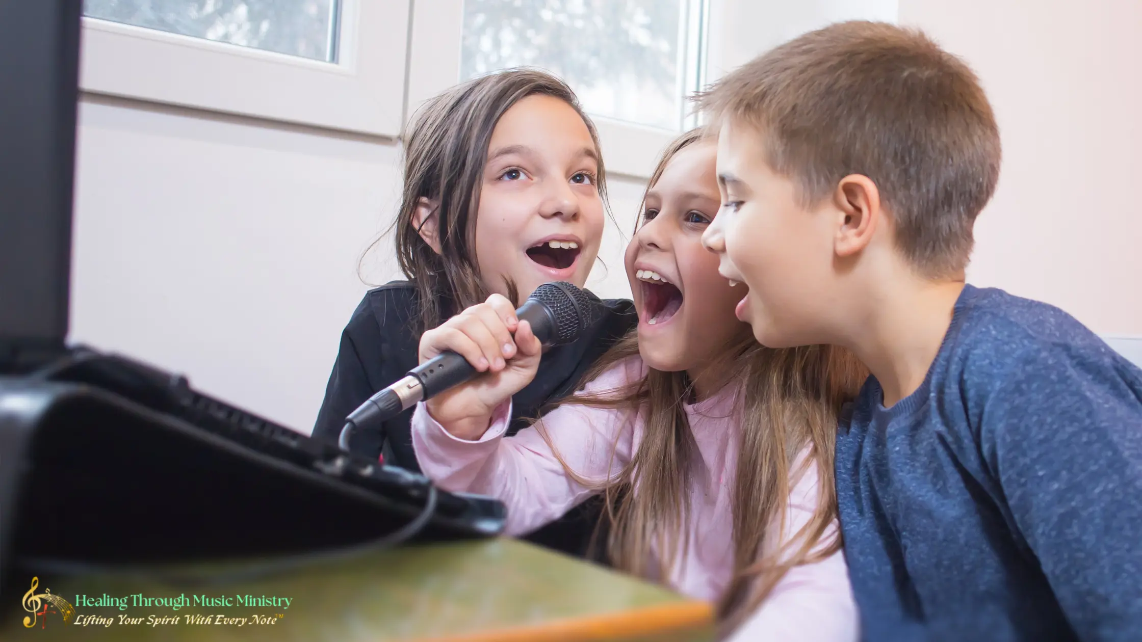 Three children singing together into a microphone indoors.